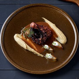 Χταπόδι Γλασαρισμένο με Εσπεριδοειδή και Φάβα